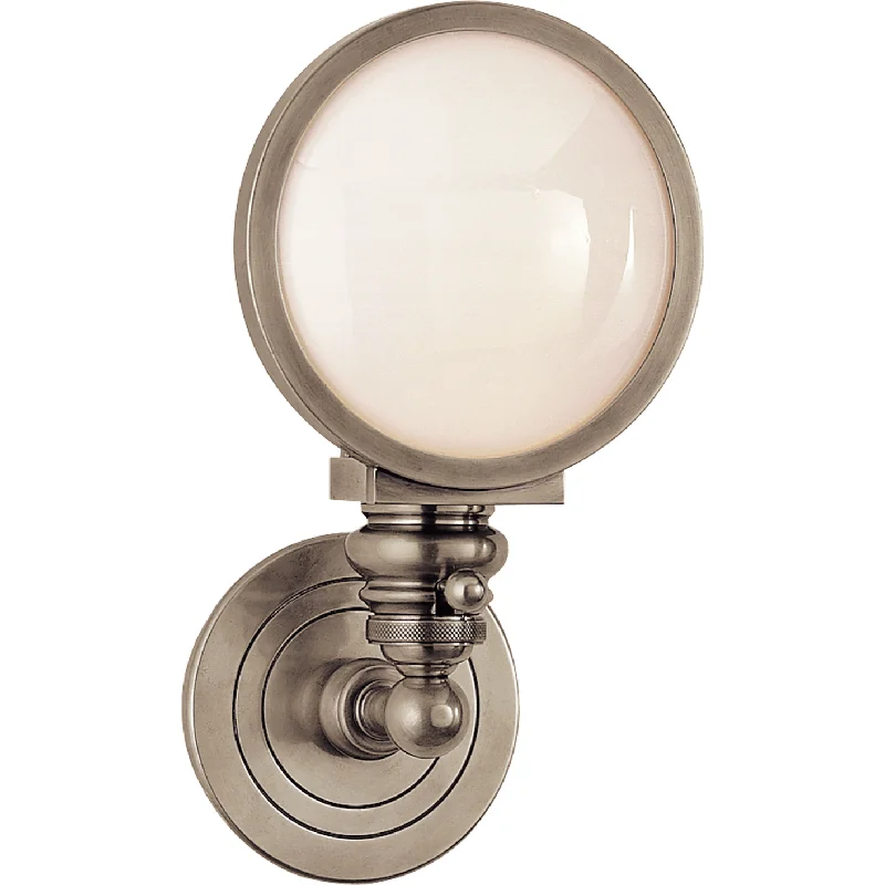 Track lighting for creating a moody atmosphereBoston Head Light Sconce