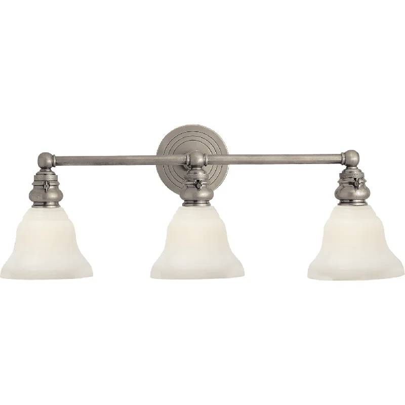 Track lighting for creating a focal pointBoston Functional Triple Light with White Glass Track lighting for creating a focal pointBoston Functional Triple Light with White Glass