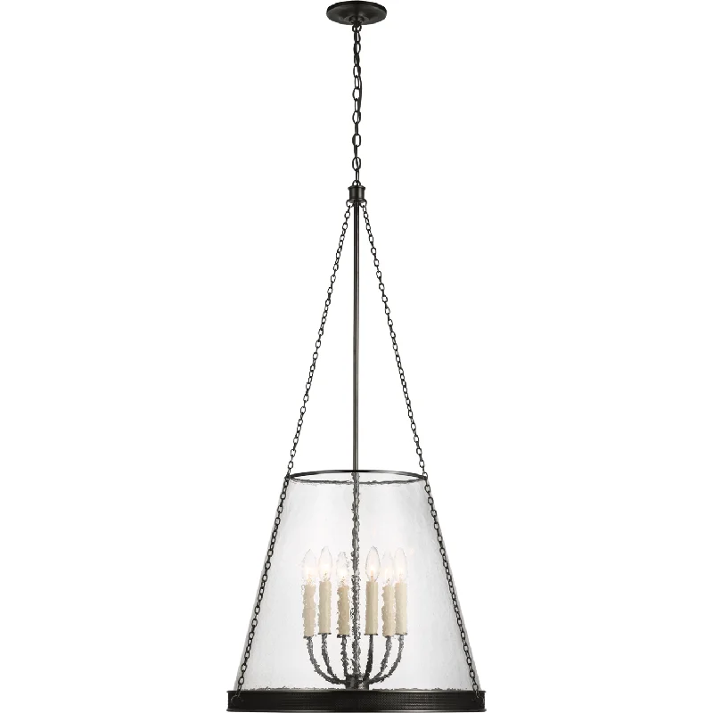 Track lighting with multiple heads for flexibilityReese 22" Pendant