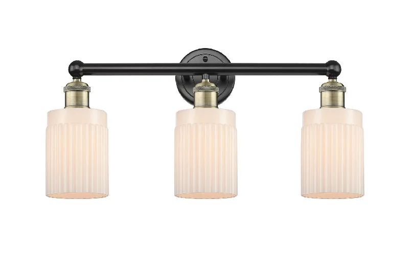 Dust - Resistant Industrial Lighting for Dirty WorkspacesEdison Three Light Bath Vanity Dust - Resistant Industrial Lighting for Dirty WorkspacesEdison Three Light Bath Vanity