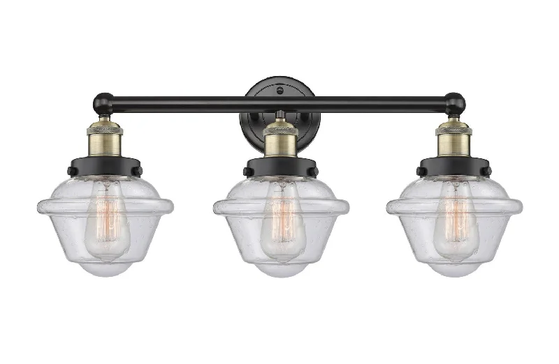 Dust - Resistant Industrial Lighting for Dirty WorkspacesEdison Three Light Bath Vanity Dust - Resistant Industrial Lighting for Dirty WorkspacesEdison Three Light Bath Vanity